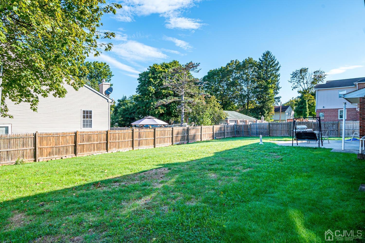 1037 Hamilton Street Somerset, NJ 08873 - Photo 27 of 29 a view of yard with house and green space