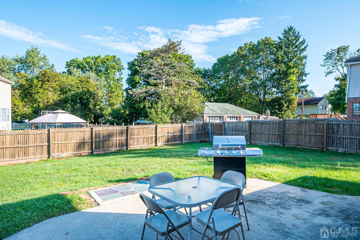 1037 Hamilton Street Somerset, NJ 08873 - Photo 28 of 29 a view of a house with a yard and sitting area