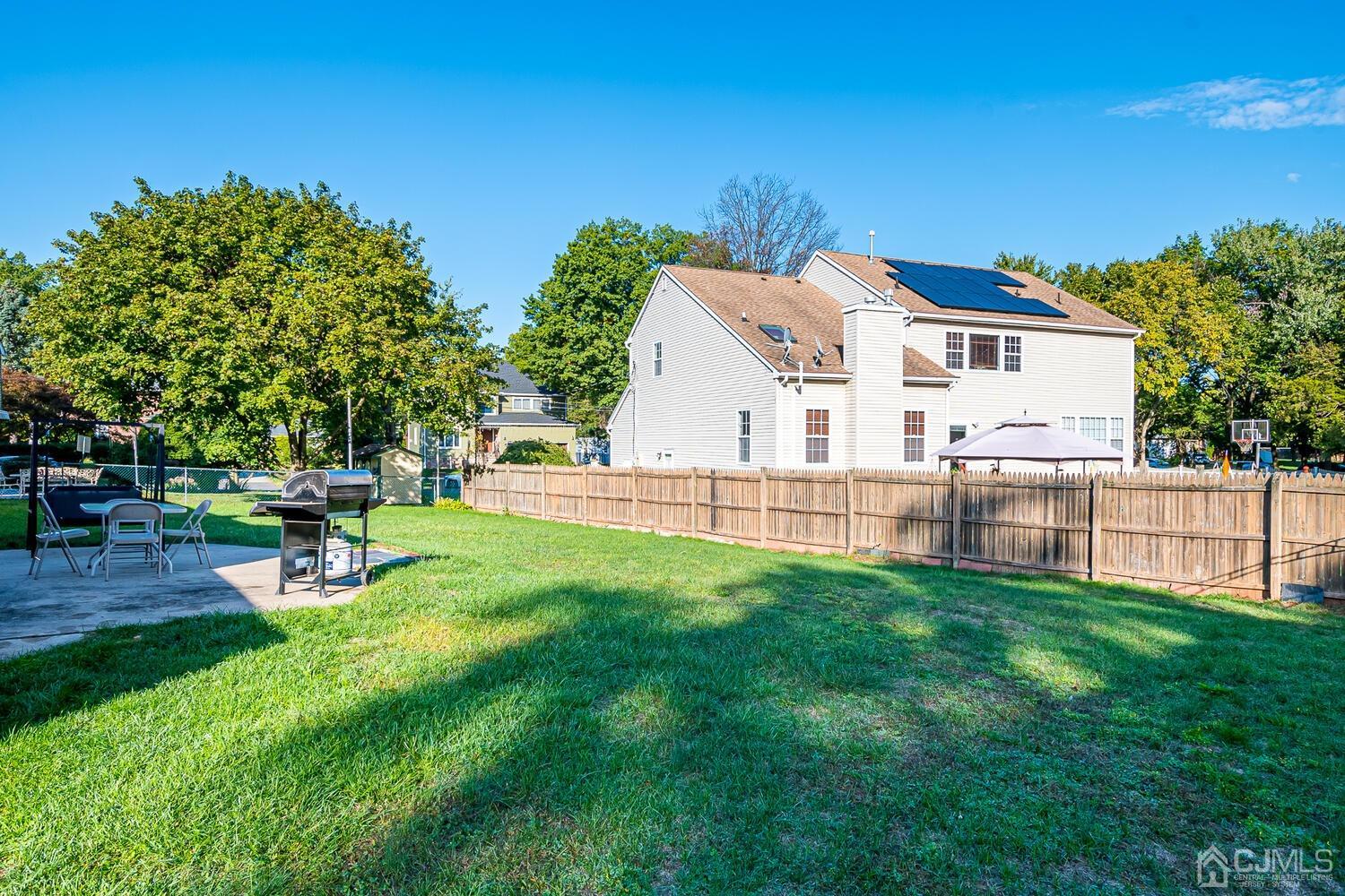 1037 Hamilton Street Somerset, NJ 08873 - Photo 29 of 29 a view of a house with a yard porch and sitting area