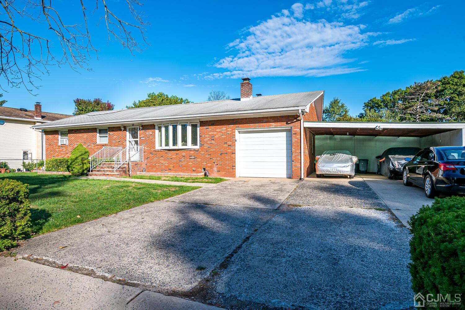1037 Hamilton Street Somerset, NJ 08873 - Photo 3 of 29 a front view of a house with garden