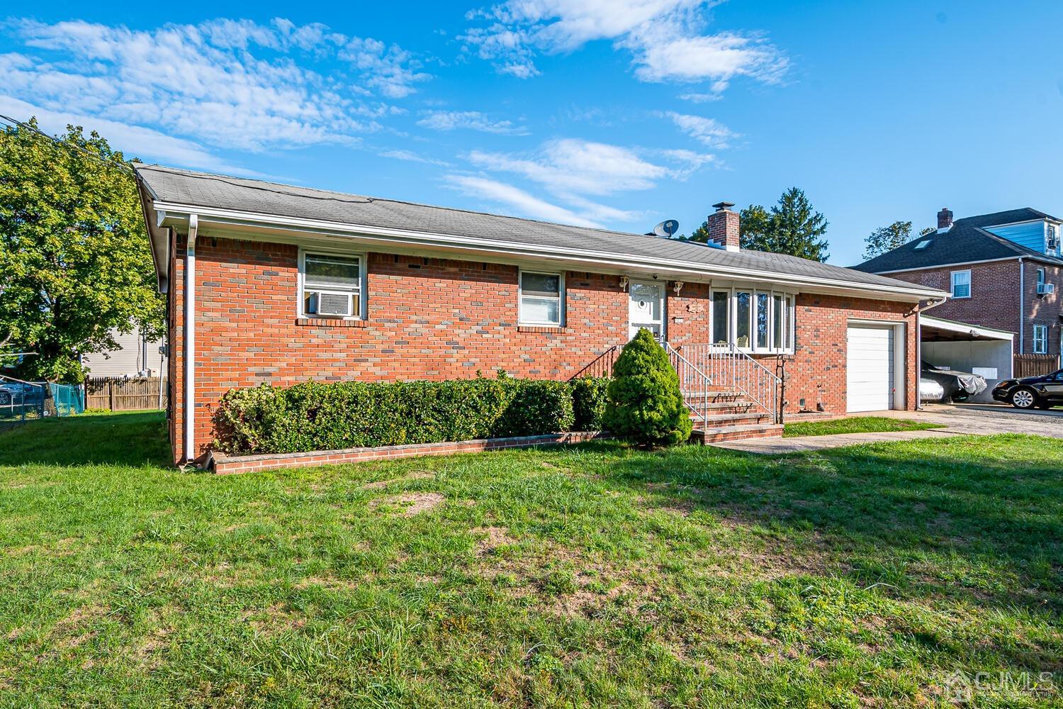 1037 Hamilton Street Somerset, NJ 08873 - Photo 4 of 29 a front view of house with yard and green space