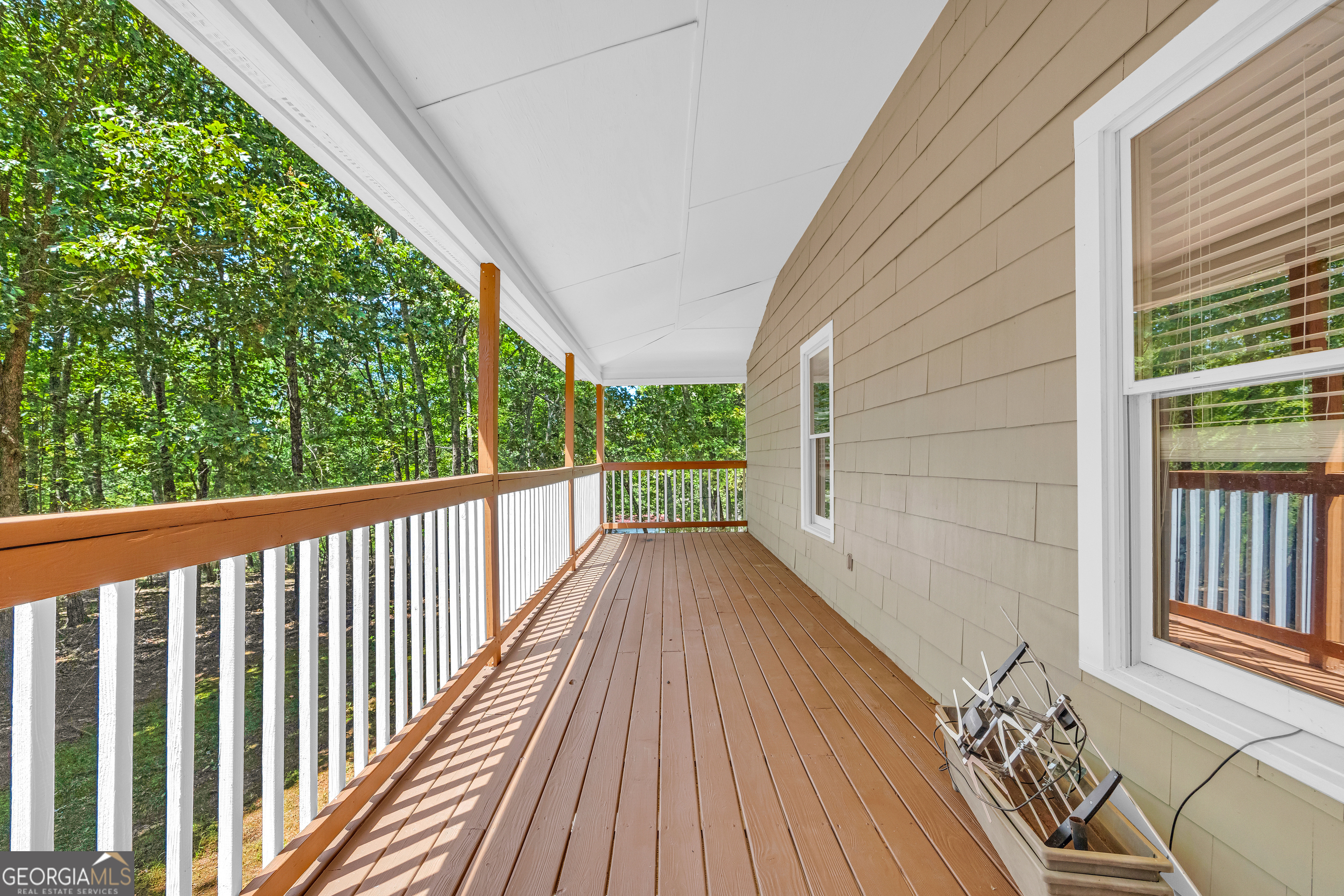 807 Satterfield Road Cleveland, GA 30528 - Photo 14 of 99 a view of balcony with wooden floor