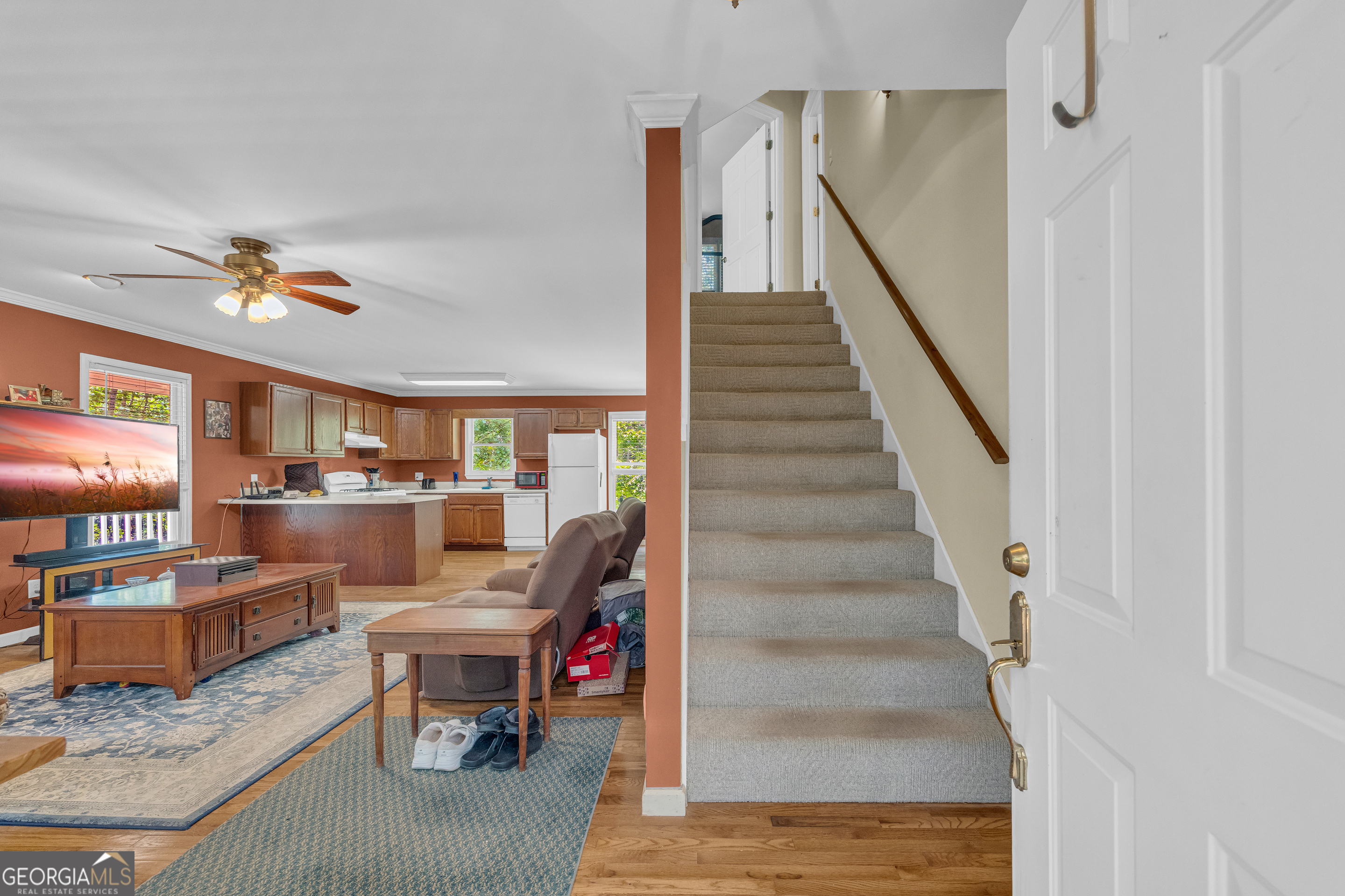 807 Satterfield Road Cleveland, GA 30528 - Photo 17 of 99 a living room with furniture and a potted plant