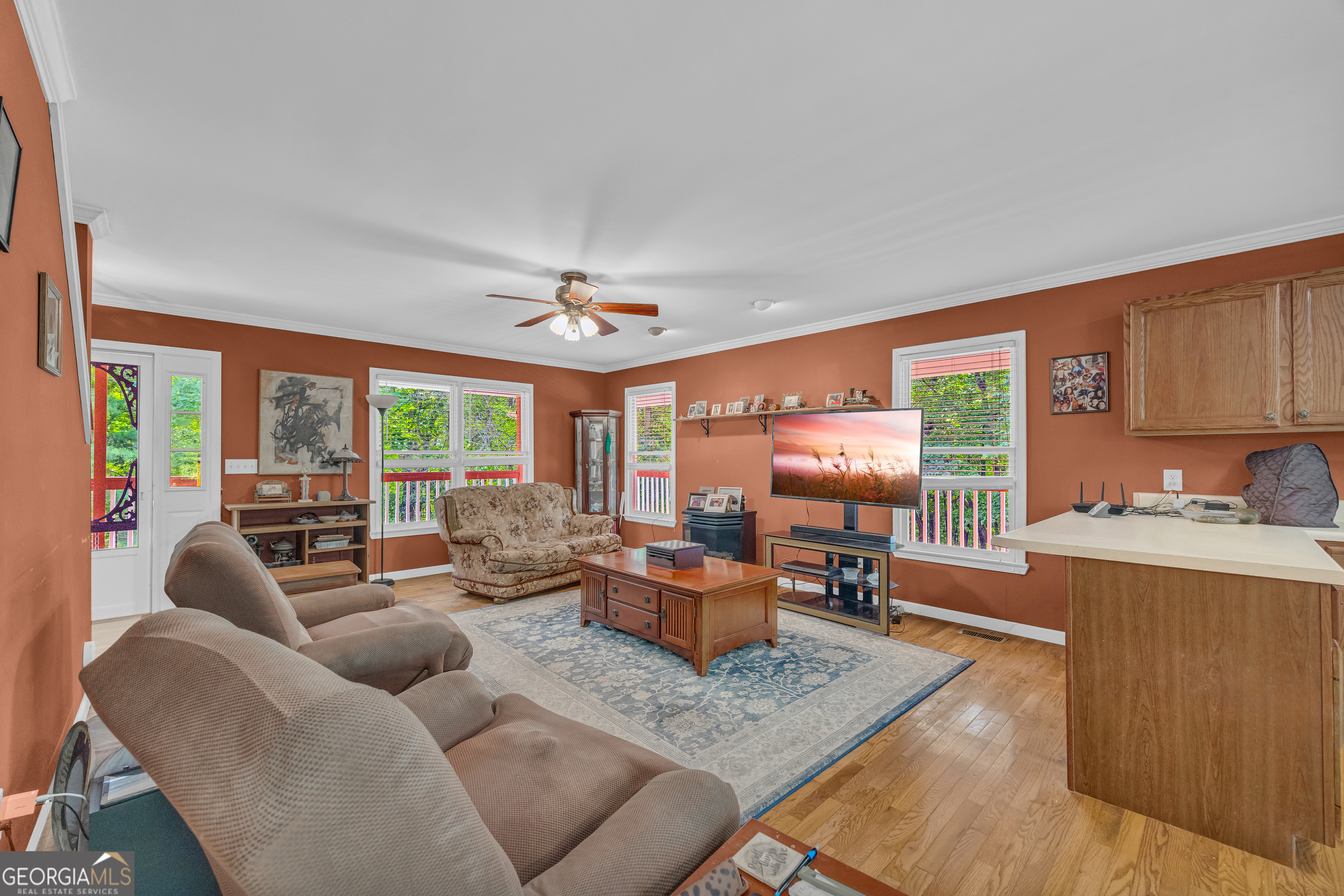 807 Satterfield Road Cleveland, GA 30528 - Photo 22 of 99 a living room with furniture and a large window