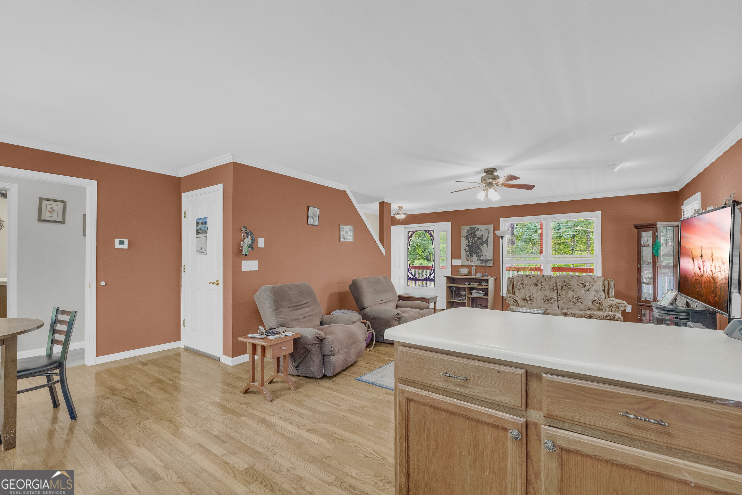 807 Satterfield Road Cleveland, GA 30528 - Photo 31 of 99 a living room with furniture and a large window