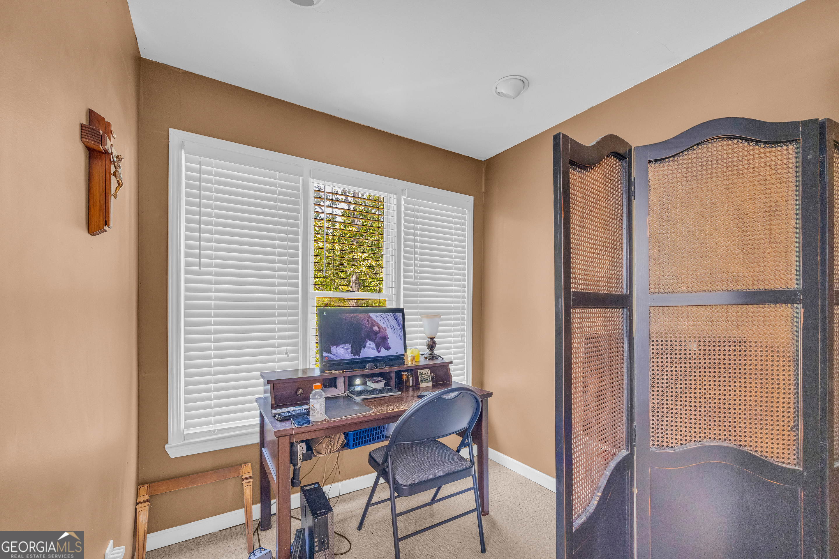 807 Satterfield Road Cleveland, GA 30528 - Photo 40 of 99 a view of a workspace with furniture and a window