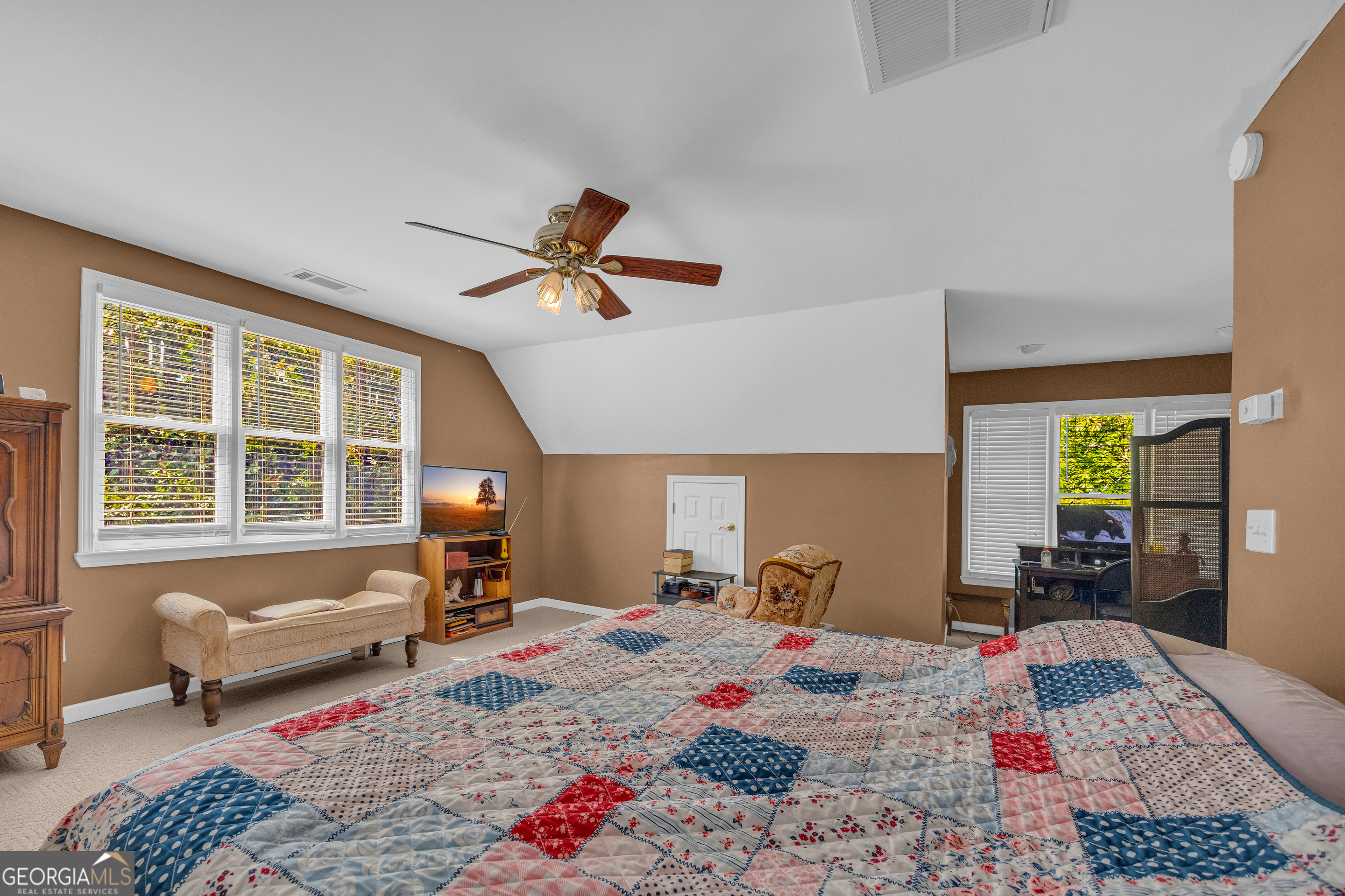 807 Satterfield Road Cleveland, GA 30528 - Photo 46 of 99 a bed room with furniture and a window