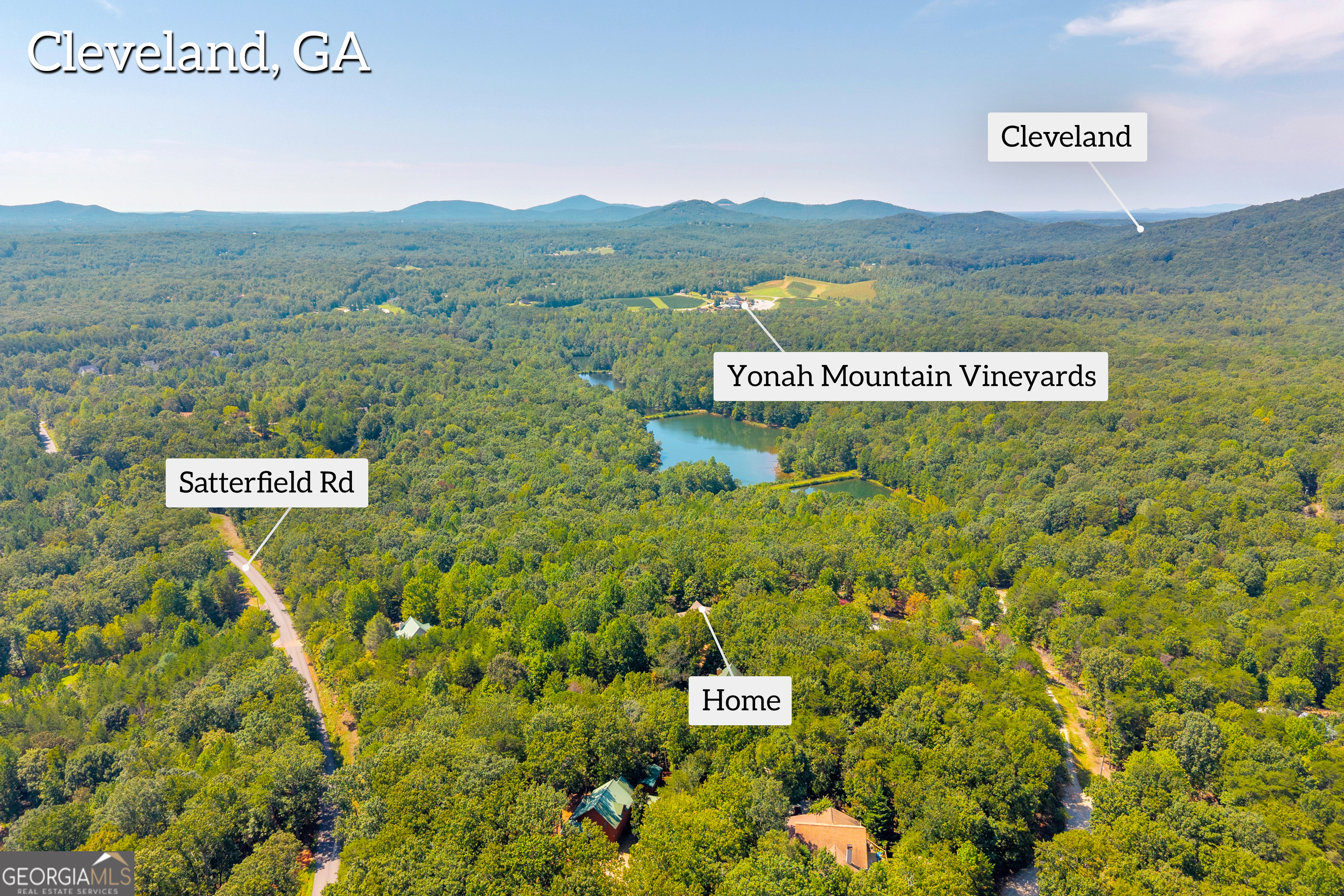 807 Satterfield Road Cleveland, GA 30528 - Photo 80 of 99 a view of outdoor space with signage and flags