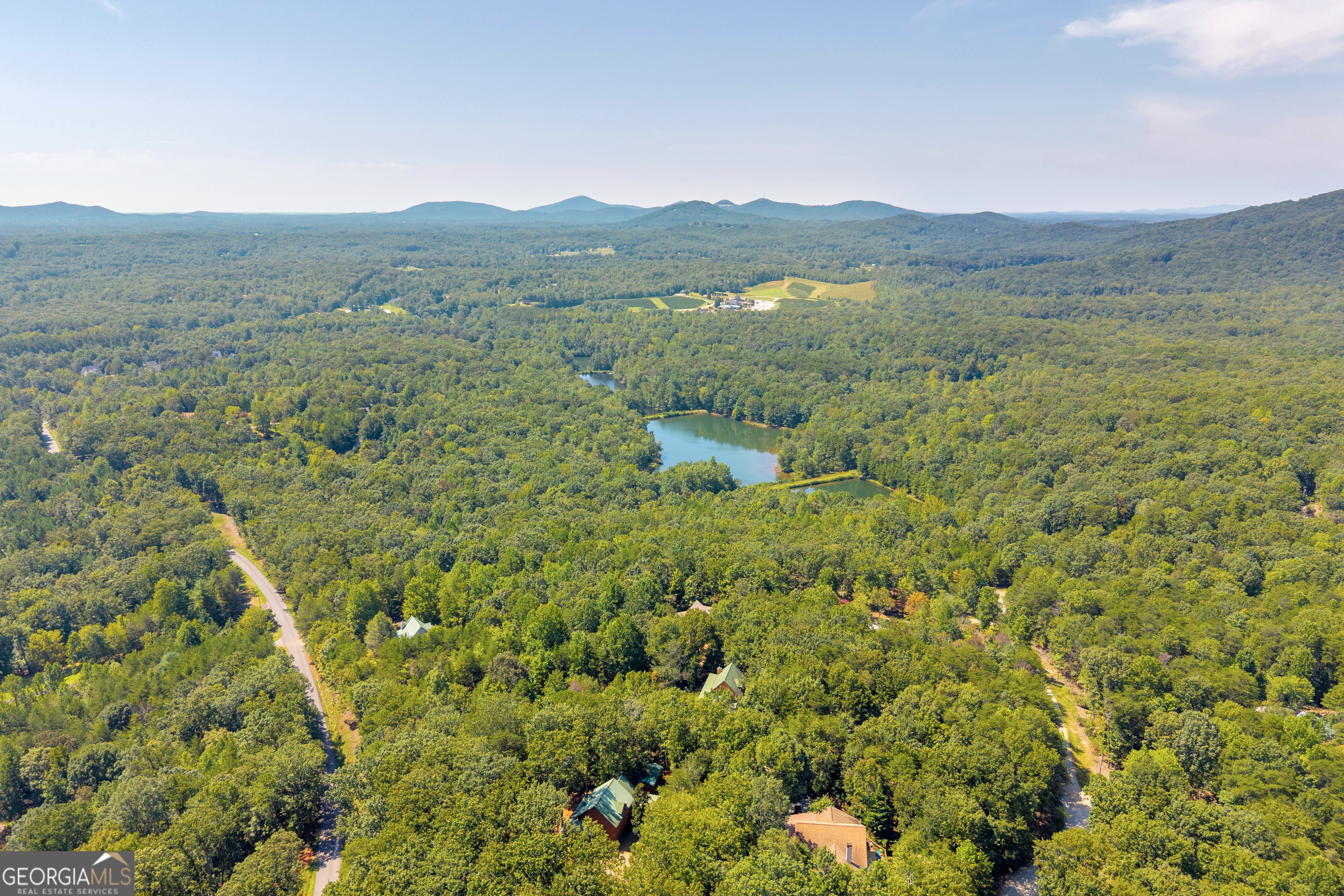 807 Satterfield Road Cleveland, GA 30528 - Photo 83 of 99 a view of a lush green hillside and houses