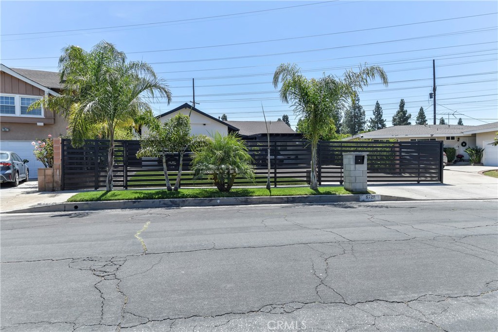 9728 Rhea Avenue Northridge, CA 91324 - Photo 3 of 36 a view of a house with a yard and potted plants
