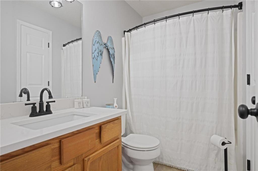342 Miller Path Temple, GA 30179 - Photo 23 of 47 a bathroom with a sink and a mirror