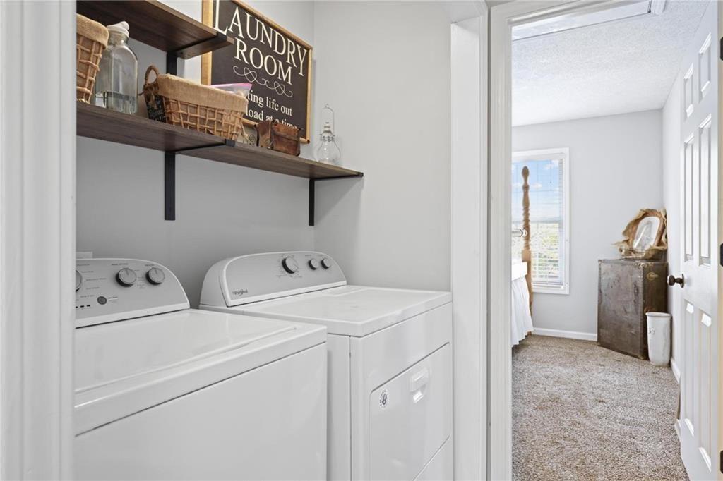 342 Miller Path Temple, GA 30179 - Photo 24 of 47 a utility room with dryer and washer