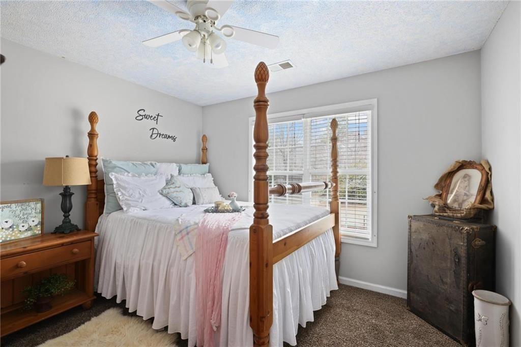 342 Miller Path Temple, GA 30179 - Photo 25 of 47 a bedroom with bed and window
