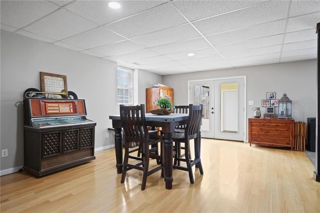 342 Miller Path Temple, GA 30179 - Photo 28 of 47 a dining room with furniture and wooden floor