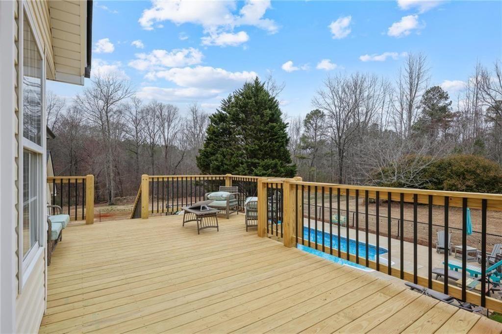 342 Miller Path Temple, GA 30179 - Photo 33 of 47 a balcony with wooden floor and fence