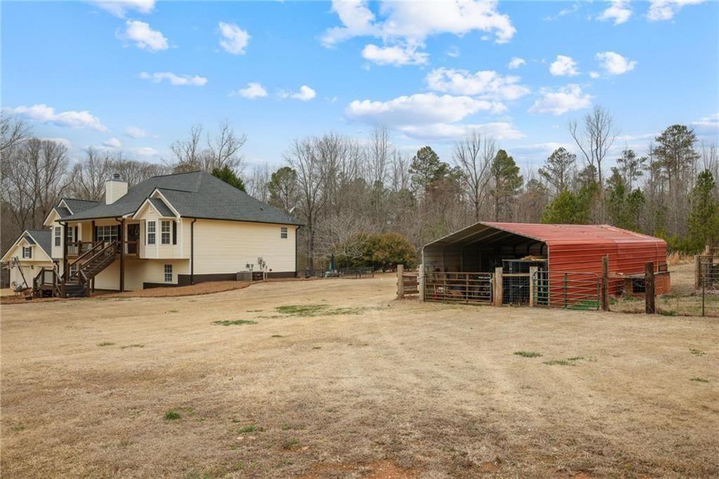 342 Miller Path Temple, GA 30179 - Photo 39 of 47 a view of a house with a yard and sitting area