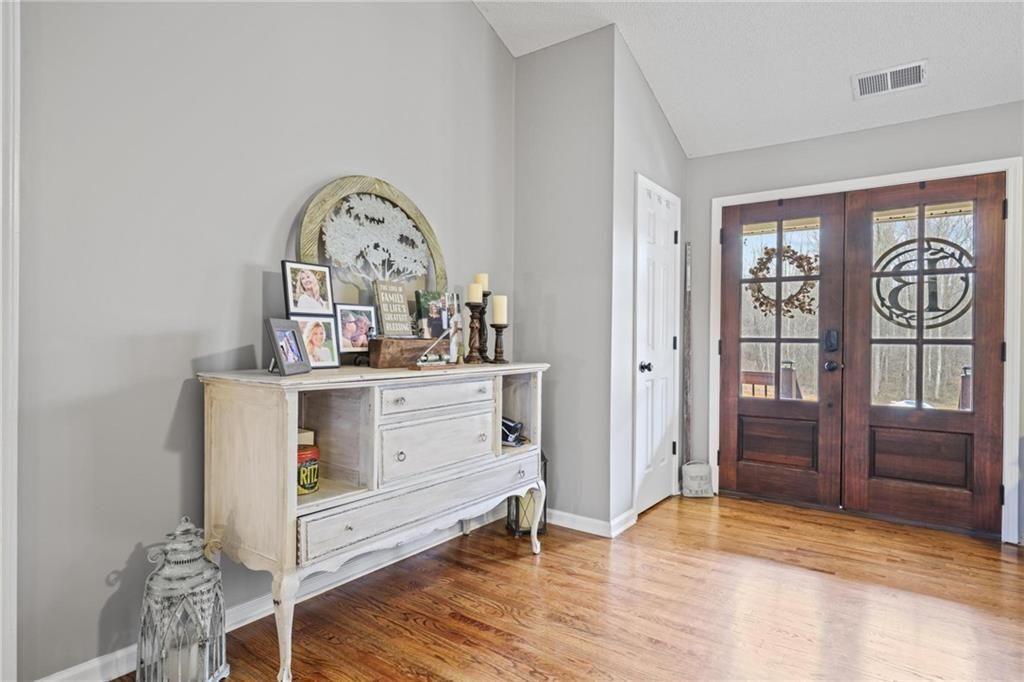 342 Miller Path Temple, GA 30179 - Photo 6 of 47 a view of room with window and wooden floor