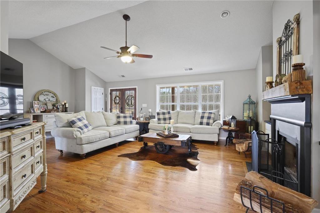 342 Miller Path Temple, GA 30179 - Photo 7 of 47 a living room with fireplace furniture and a fireplace