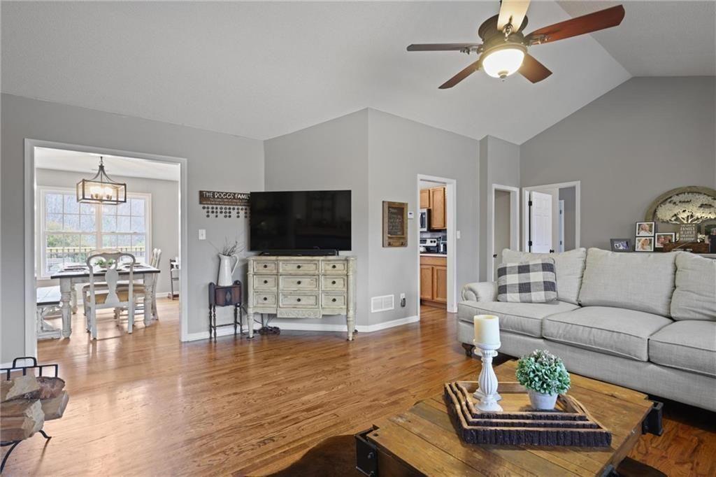 342 Miller Path Temple, GA 30179 - Photo 10 of 47 a living room with furniture and a flat screen tv