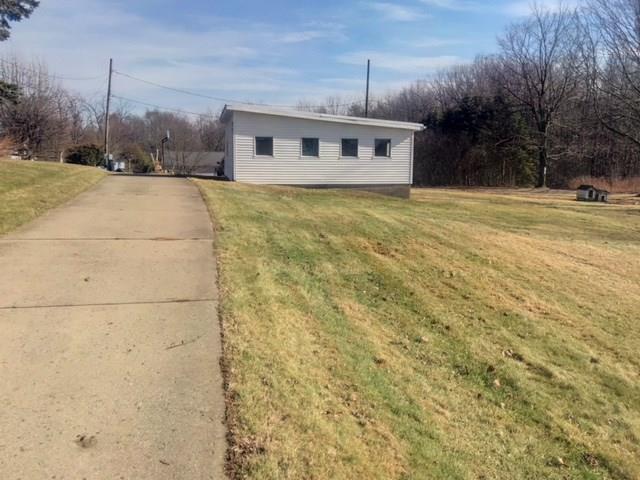 2106 Brodhead Road Aliquippa, PA 15001 - Photo 6 of 18 Nice concrete drive not only offers easy access but also ample parking for your visitors.