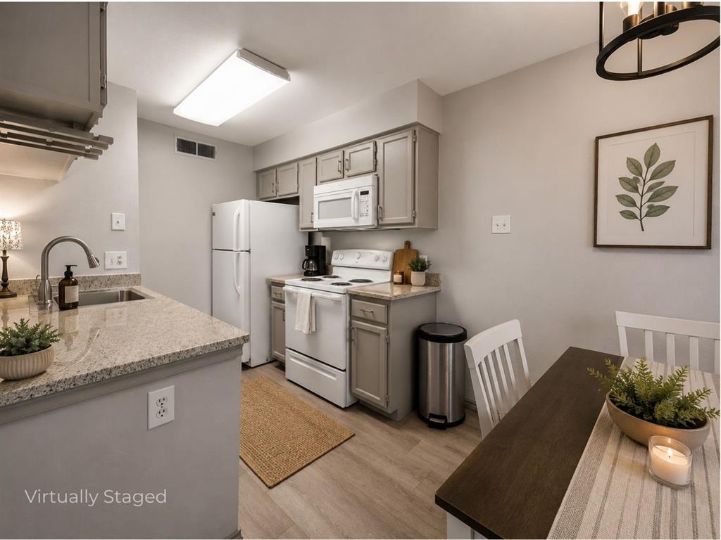 5750 Phoenix Drive, Unit 22 Dallas, TX 75231 - Photo 13 of 30 Virtually Staged Kitchen