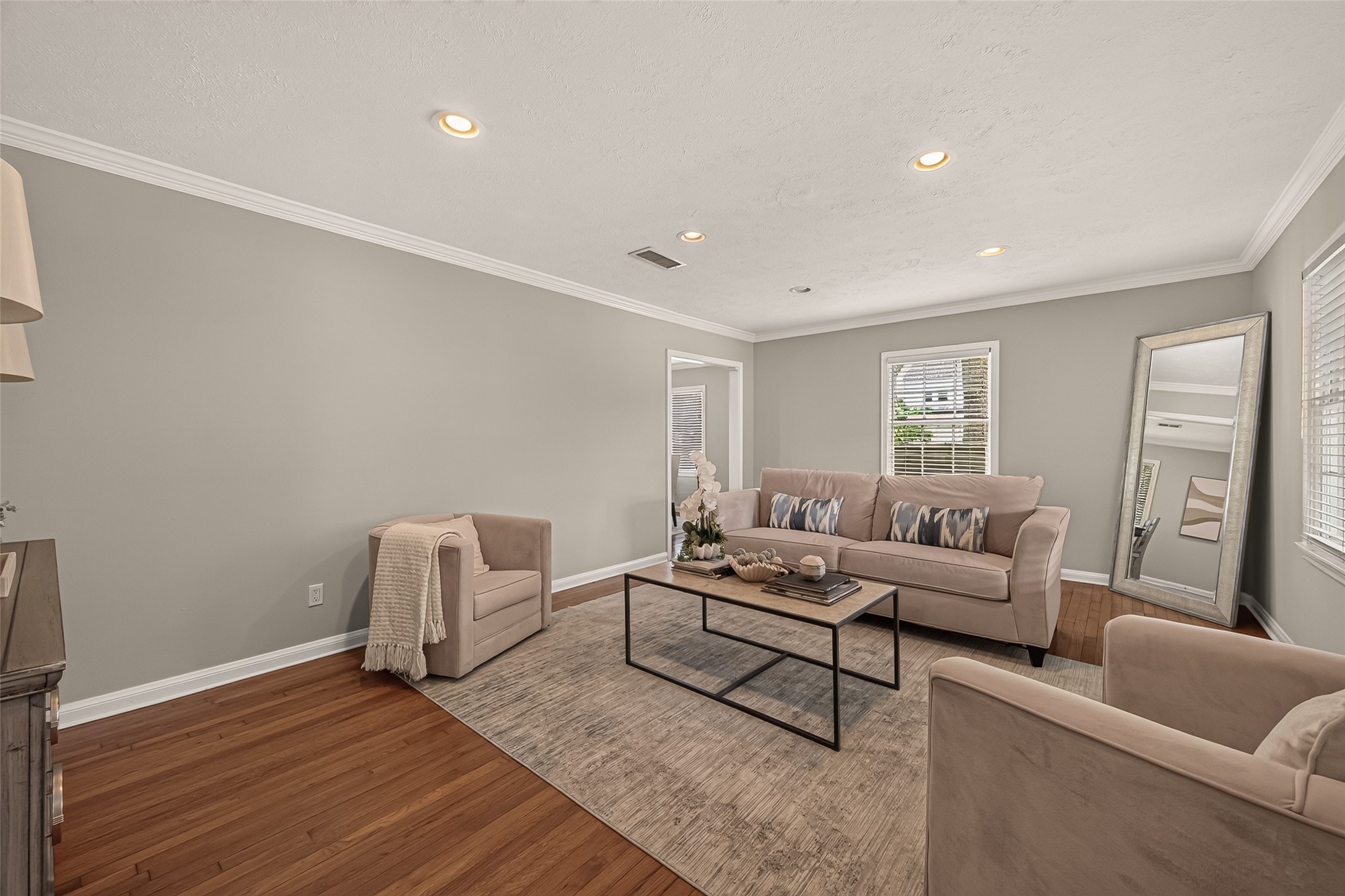 2019 Gostick Street Houston, TX 77008 - Photo 11 of 36 a living room with furniture and a wooden floor