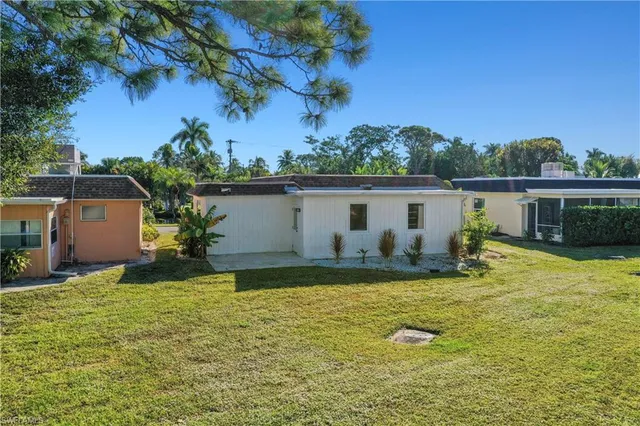 a view of a house with a big yard