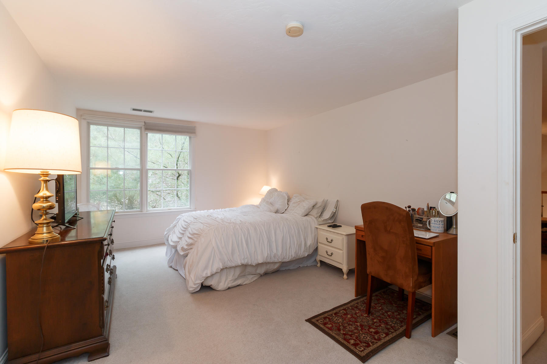 36 Windsor Point Mashpee, MA 02649 - Photo 17 of 23 a bedroom with a bed and a window