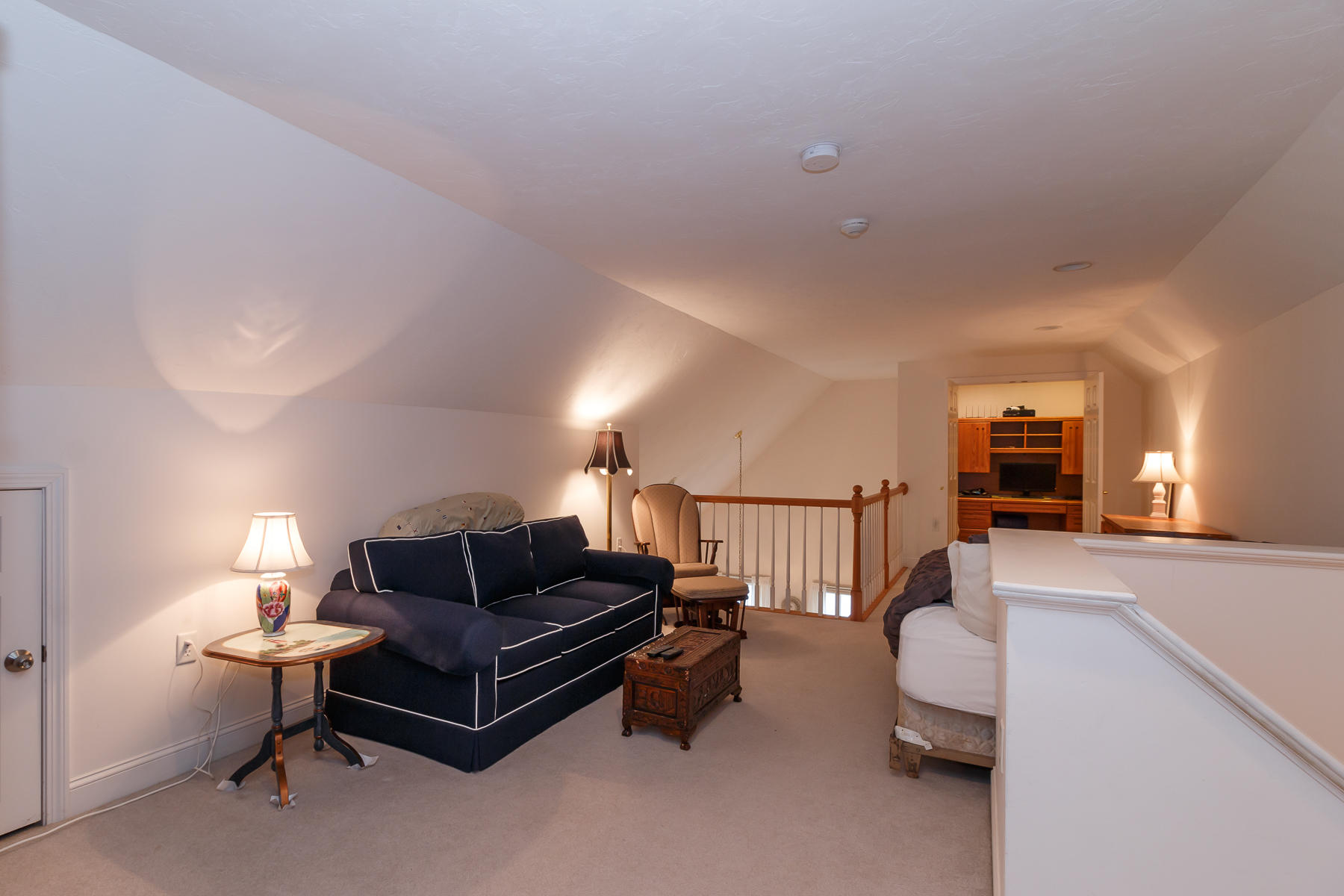 36 Windsor Point Mashpee, MA 02649 - Photo 18 of 23 a living room with furniture and a lamp