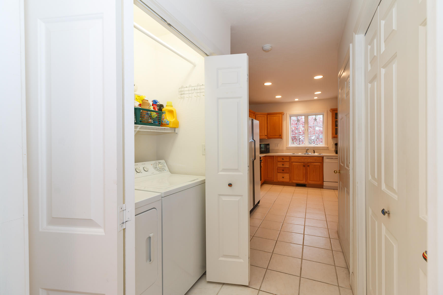 36 Windsor Point Mashpee, MA 02649 - Photo 8 of 23 a view of a hallway with bathroom and mirror