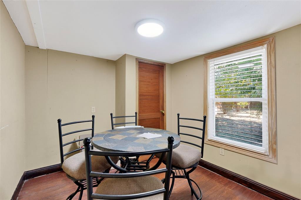 940 Rowlett Road Rowlett, TX 75088 - Photo 25 of 37 a view of a dining room with furniture window and wooden floor