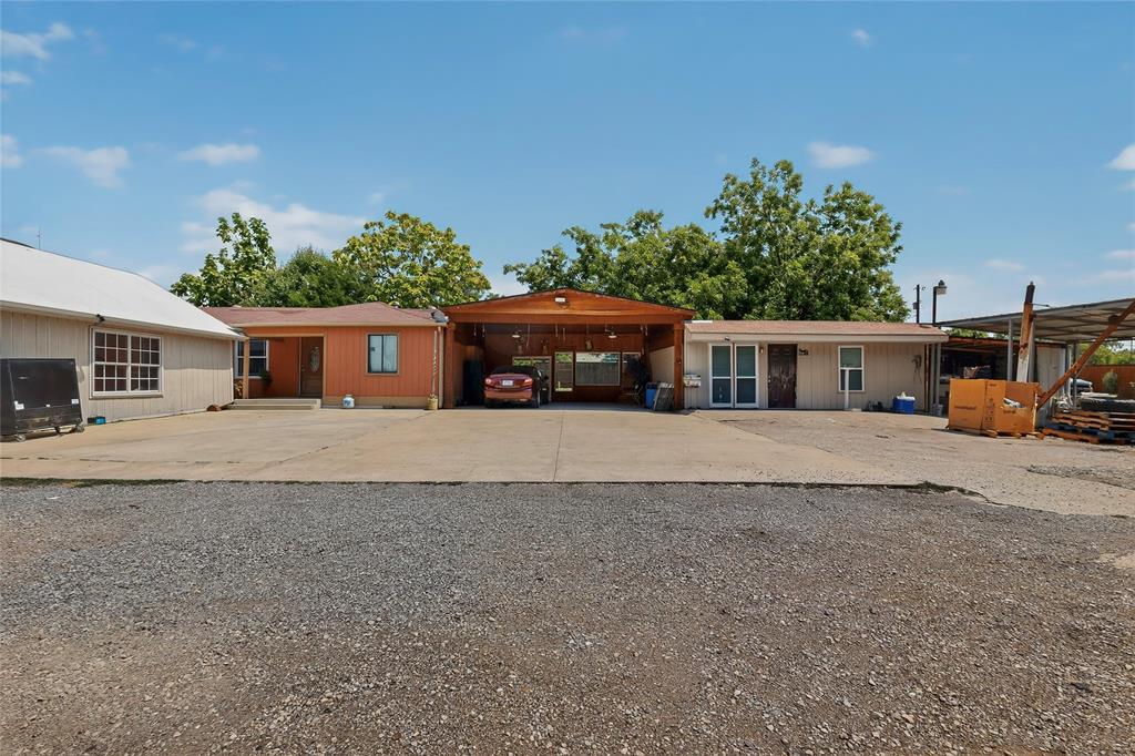 940 Rowlett Road Rowlett, TX 75088 - Photo 32 of 37 front view of a house with a yard