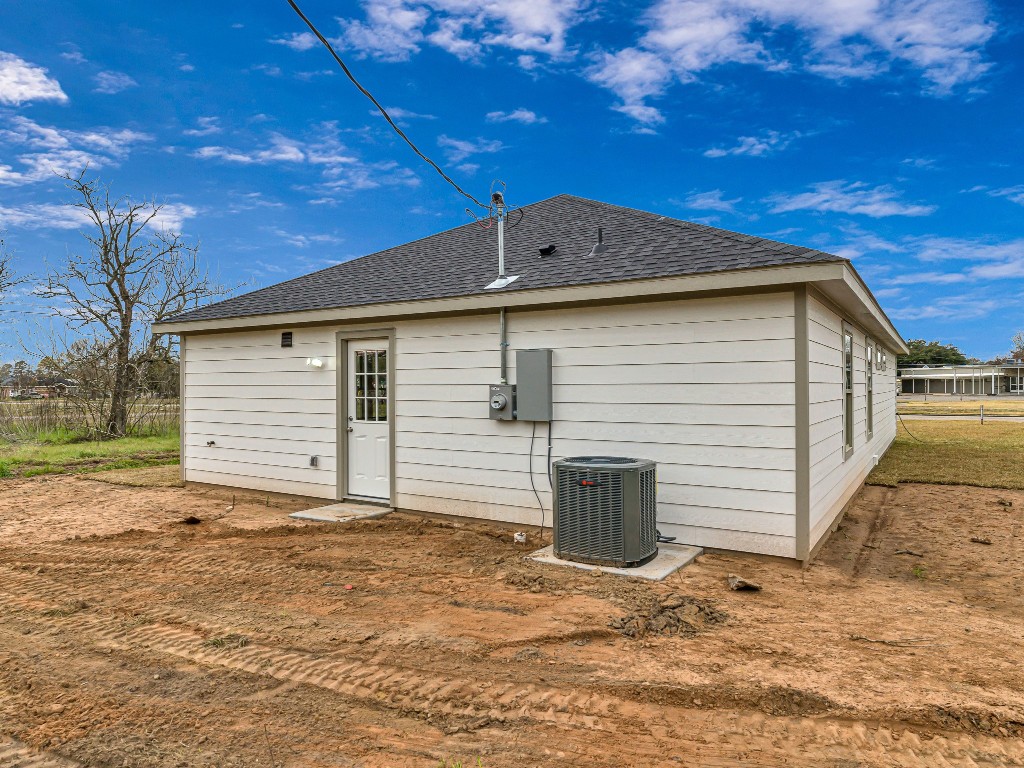 1010 4th Street Hempstead, TX 77445 - Photo 23 of 23 a view of a house with a backyard