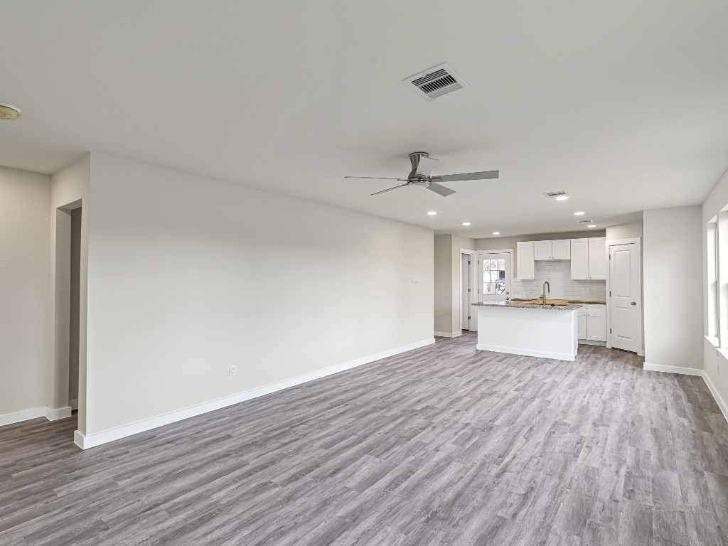 1010 4th Street Hempstead, TX 77445 - Photo 6 of 23 a view of a kitchen with a sink and wooden floor