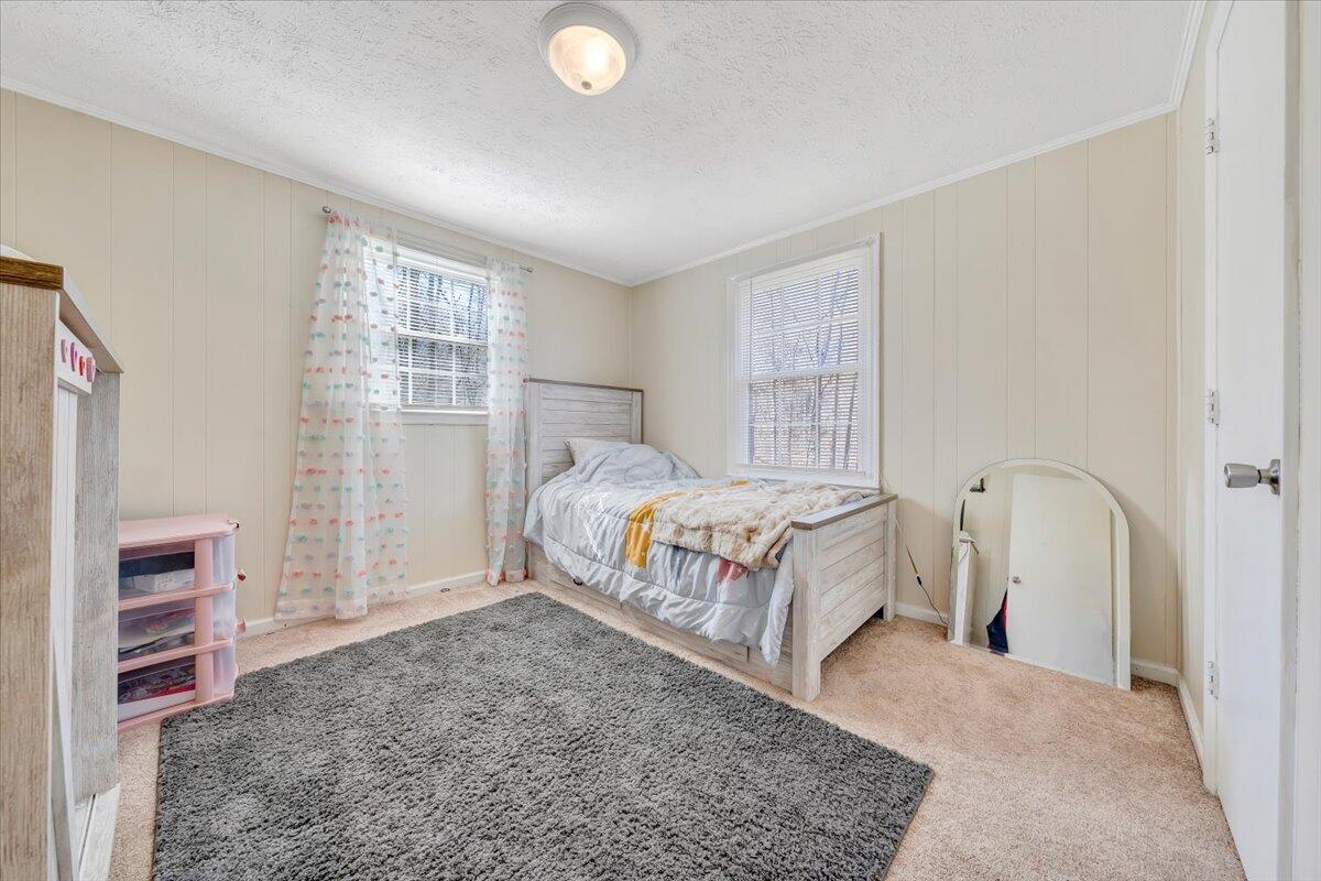 1173 Sawmill Road Ferrum, VA 24088 - Photo 11 of 39 a bedroom with a bed and a window