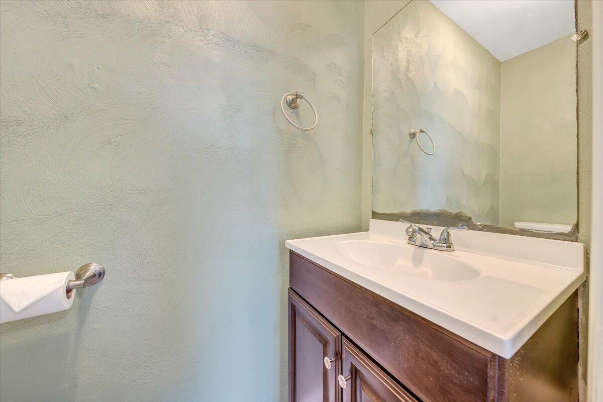1173 Sawmill Road Ferrum, VA 24088 - Photo 12 of 39 a bathroom with a sink vanity and a mirror