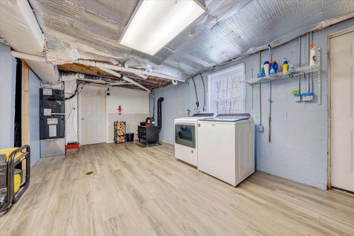1173 Sawmill Road Ferrum, VA 24088 - Photo 17 of 39 a view of a storage & utility room with washer and dryer