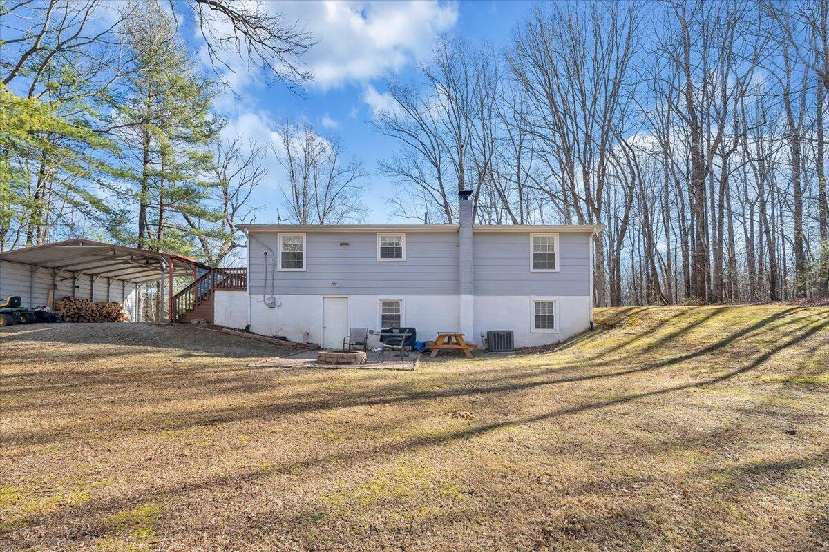 1173 Sawmill Road Ferrum, VA 24088 - Photo 22 of 39 a view of a house with snow on the side of the road