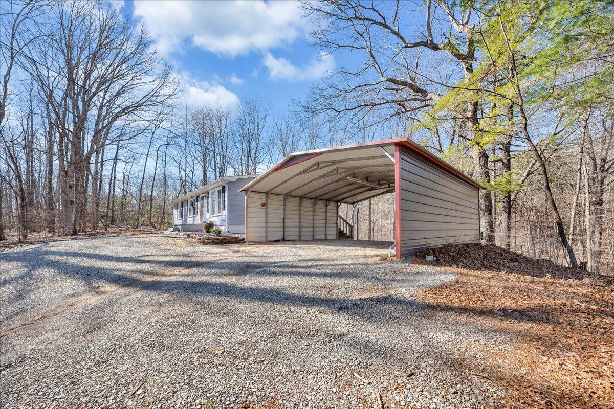 1173 Sawmill Road Ferrum, VA 24088 - Photo 24 of 39 a view of a yard with a large tree