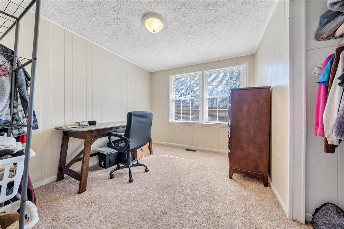 1173 Sawmill Road Ferrum, VA 24088 - Photo 5 of 39 a workspace with furniture and a window