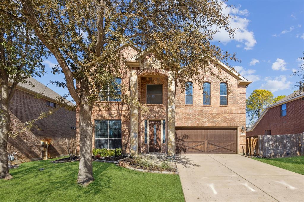1918 Long Bow Trail Euless, TX 76040 - Photo 1 of 1 front view of house with a yard