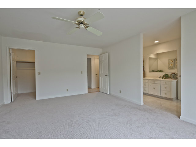 10146 Alpine Drive Cupertino, CA 95014 - Photo 11 of 15 a view of a livingroom with a kitchen space with sink