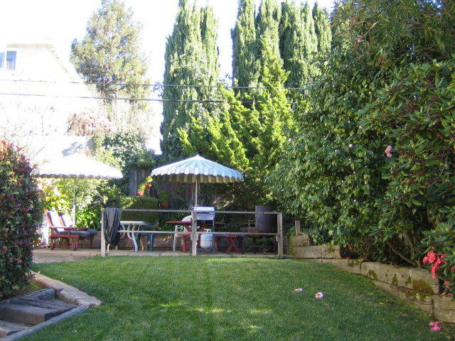 10146 Alpine Drive Cupertino, CA 95014 - Photo 13 of 15 a patio with table and chairs