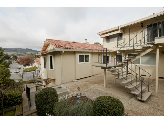 10146 Alpine Drive Cupertino, CA 95014 - Photo 2 of 15 a view of a house with backyard and porch