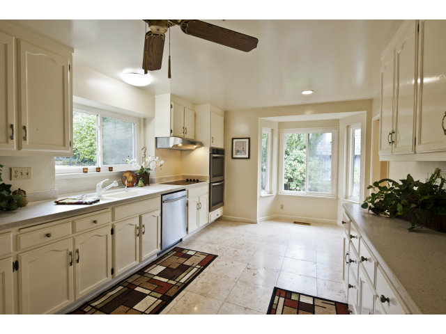 10146 Alpine Drive Cupertino, CA 95014 - Photo 5 of 15 a kitchen with a sink and cabinets