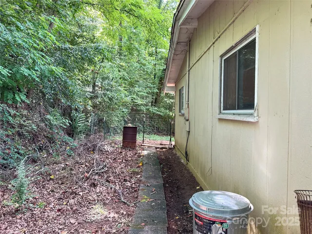 a big yard with lots of green space and deers