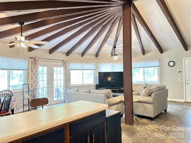 a view of a living room and a kitchen
