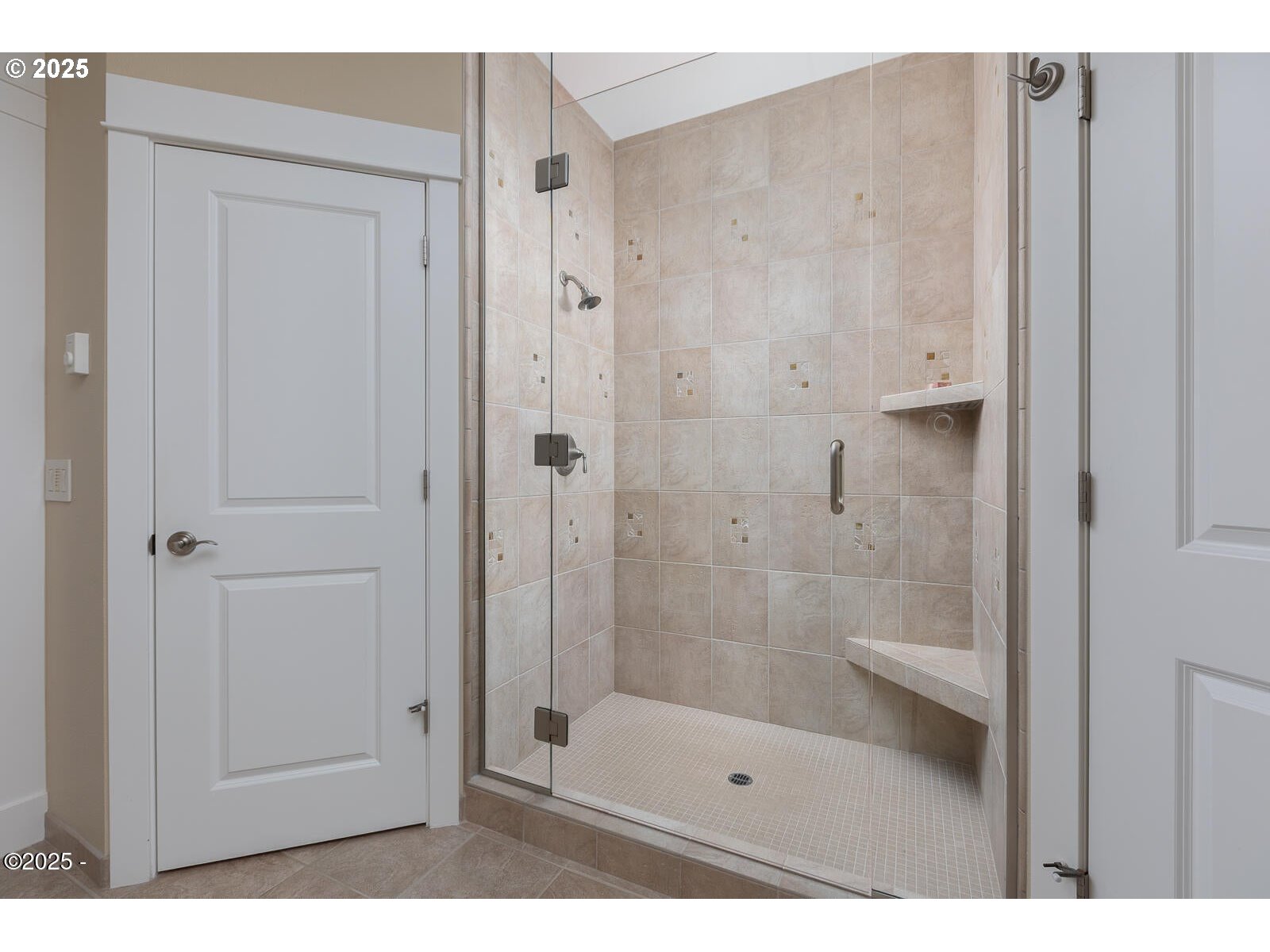 1125 Northwest Spring Street, Unit A302 Newport, OR 97365 - Photo 20 of 31 a bathroom with a shower