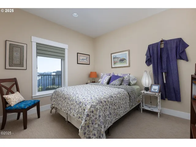 a bathroom with a granite countertop sink toilet a mirror a bathtub and shower