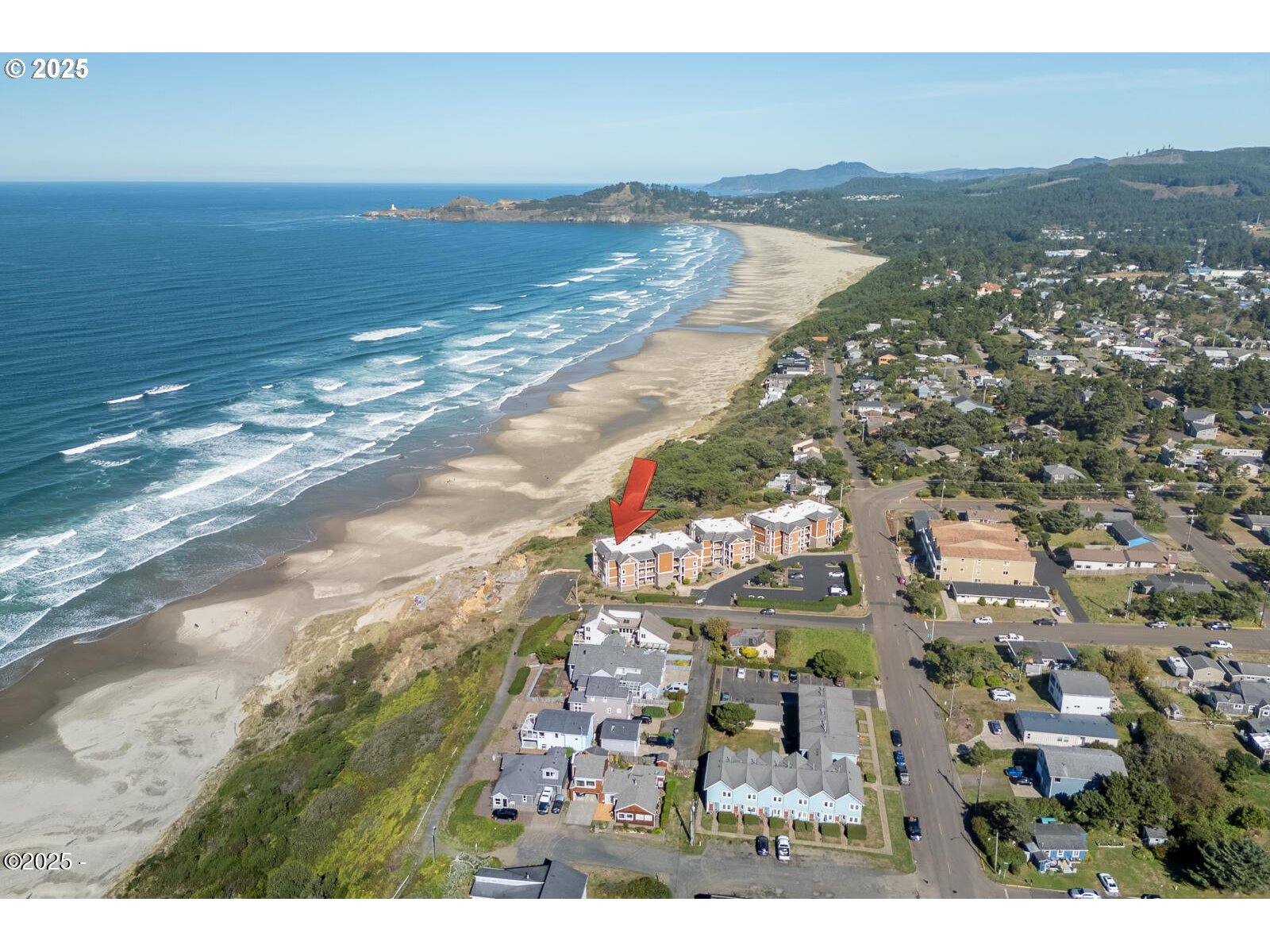 1125 Northwest Spring Street, Unit A302 Newport, OR 97365 - Photo 28 of 31 a view of a city with ocean view